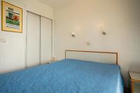 Posteľ alebo postele v izbe v ubytovaní Coté Jardin, Villa de Cap Esterel