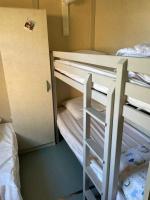 Łóżko lub łóżka w pokoju w obiekcie Chalet avec patio en Haute Corse 5 couchages