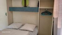 Łóżko lub łóżka w pokoju w obiekcie Chalet avec patio en Haute Corse 5 couchages