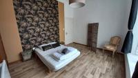 Łóżko lub łóżka w pokoju w obiekcie STUDIOS ET APPARTEMENTS EN CENTRE VILLE Boulogne sur mer
