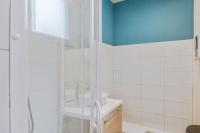 Kúpeľňa v ubytovaní SERENITE - Appartement climatisé au calme - WIFI