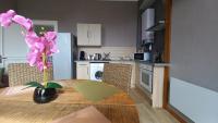 Kuchnia lub aneks kuchenny w obiekcie STUDIOS ET APPARTEMENTS EN CENTRE VILLE Boulogne sur mer