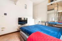 A bed or beds in a room at Grazioso
