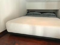 A bed or beds in a room at Grazioso