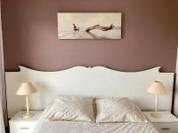 Łóżko lub łóżka w pokoju w obiekcie Les Restanques Maison 14 Chênes