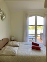 Łóżko lub łóżka w pokoju w obiekcie Les Restanques Maison 14 Chênes