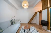 Telewizja i/lub zestaw kina domowego w obiekcie Aguirre apartment by People Rentals