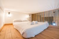 Łóżko lub łóżka w pokoju w obiekcie Aguirre apartment by People Rentals