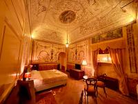 Posteľ alebo postele v izbe v ubytovaní Casa Santangelo Suites
