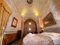 Posteľ alebo postele v izbe v ubytovaní Casa Santangelo Suites