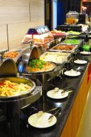 a buffet line with many different types of food at Chateau-Rich Hotel in Tainan