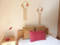 Postel nebo postele na pokoji v ubytování Villa Maria Rosa - - Koutsoubri Beach Evia