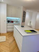Kuchyňa alebo kuchynka v ubytovaní Bel Appartement avec parking au coeur de Reims