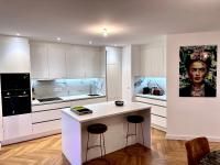 Kuchyňa alebo kuchynka v ubytovaní Bel Appartement avec parking au coeur de Reims
