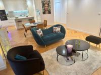 Posedenie v ubytovaní Bel Appartement avec parking au coeur de Reims