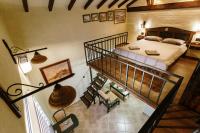 an overhead view of a bedroom with a bed at Apartmani Sirmium in Sremska Mitrovica