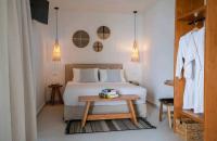 Postel nebo postele na pokoji v ubytování Thea Beachfront Suites in Lourdas beach