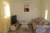 Televízia a/alebo spoločenská miestnosť v ubytovaní Holiday home Zadar