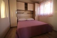 Posteľ alebo postele v izbe v ubytovaní Holiday home Zadar