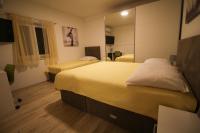 Posteľ alebo postele v izbe v ubytovaní Holiday home Zadar