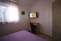 Televízia a/alebo spoločenská miestnosť v ubytovaní Holiday home Zadar