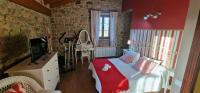 TV a/nebo společenská místnost v ubytování Apartamentos Casa Bárbora - AR-720-AS