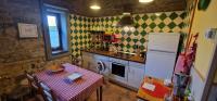 Kuchyň nebo kuchyňský kout v ubytování Apartamentos Casa Bárbora - AR-720-AS
