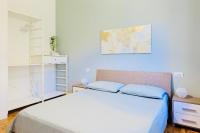 A bed or beds in a room at Villa Caramino