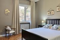 A bed or beds in a room at Villa Caramino