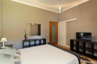 A bed or beds in a room at Villa Caramino