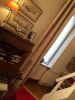 Televízia a/alebo spoločenská miestnosť v ubytovaní CHARMING FLAT IN HISTORICAL CENTRE