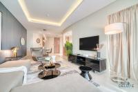 TV a/nebo společenská místnost v ubytování Polished 3BR at DAMAC Towers by Paramount A Business Bay by Deluxe Holiday Homes