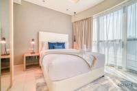 Postel nebo postele na pokoji v ubytování Polished 3BR at DAMAC Towers by Paramount A Business Bay by Deluxe Holiday Homes