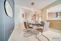 Posezení v ubytování Polished 3BR at DAMAC Towers by Paramount A Business Bay by Deluxe Holiday Homes