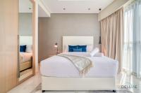 Postel nebo postele na pokoji v ubytování Polished 3BR at DAMAC Towers by Paramount A Business Bay by Deluxe Holiday Homes