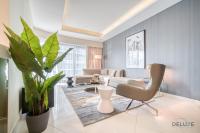 Posezení v ubytování Polished 3BR at DAMAC Towers by Paramount A Business Bay by Deluxe Holiday Homes