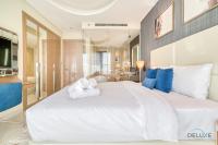 Postel nebo postele na pokoji v ubytování Polished 3BR at DAMAC Towers by Paramount A Business Bay by Deluxe Holiday Homes