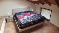 Posteľ alebo postele v izbe v ubytovaní CASA VAL DEL RISO