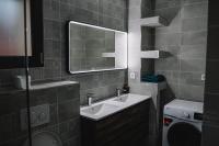 Łazienka w obiekcie Grande Villa cosy avec piscine, sauna & jacuzzi