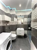 Kúpeľňa v ubytovaní Wola Apartments