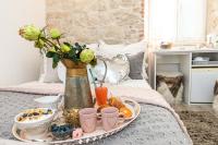 Posteľ alebo postele v izbe v ubytovaní Rooms Tomic