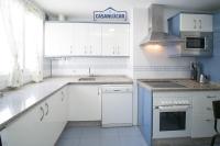 Kuchyň nebo kuchyňský kout v ubytování Apartamento Cigüeña