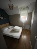 Łóżko lub łóżka w pokoju w obiekcie Location maison vacances 4 pers proche plage chez Lili Berck