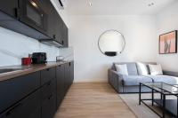 Kuchnia lub aneks kuchenny w obiekcie MONACO SEA VIEW APARTMENTS