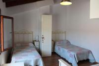 Postel nebo postele na pokoji v ubytování CASA MARGARITA