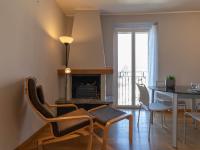 A seating area at Mamma Ciccia Holiday Home - Sunset Balcony