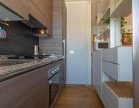 A kitchen or kitchenette at Mamma Ciccia Holiday Home - Sunset Balcony