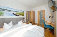 Hotel 17 Seenにあるベッド