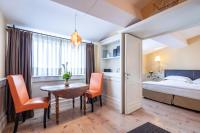 Palazzo Firenze by Baglioni Hotels & Resortsにあるベッド
