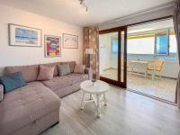 Posedenie v ubytovaní Ocean Front Apartment